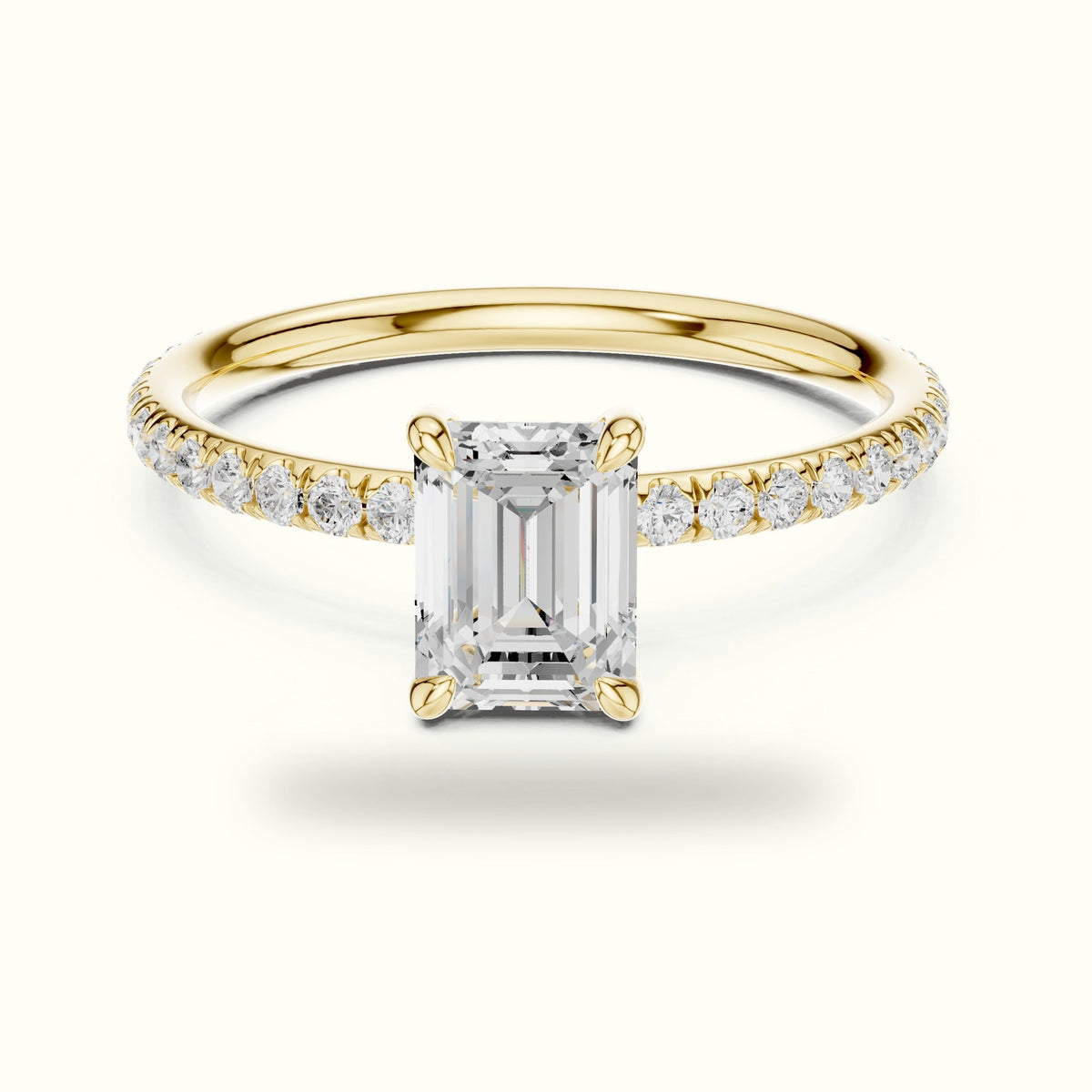 Emerald Shape Four Prong Solitaire Ring — Yellow gold, front view | Crystal N Cuts