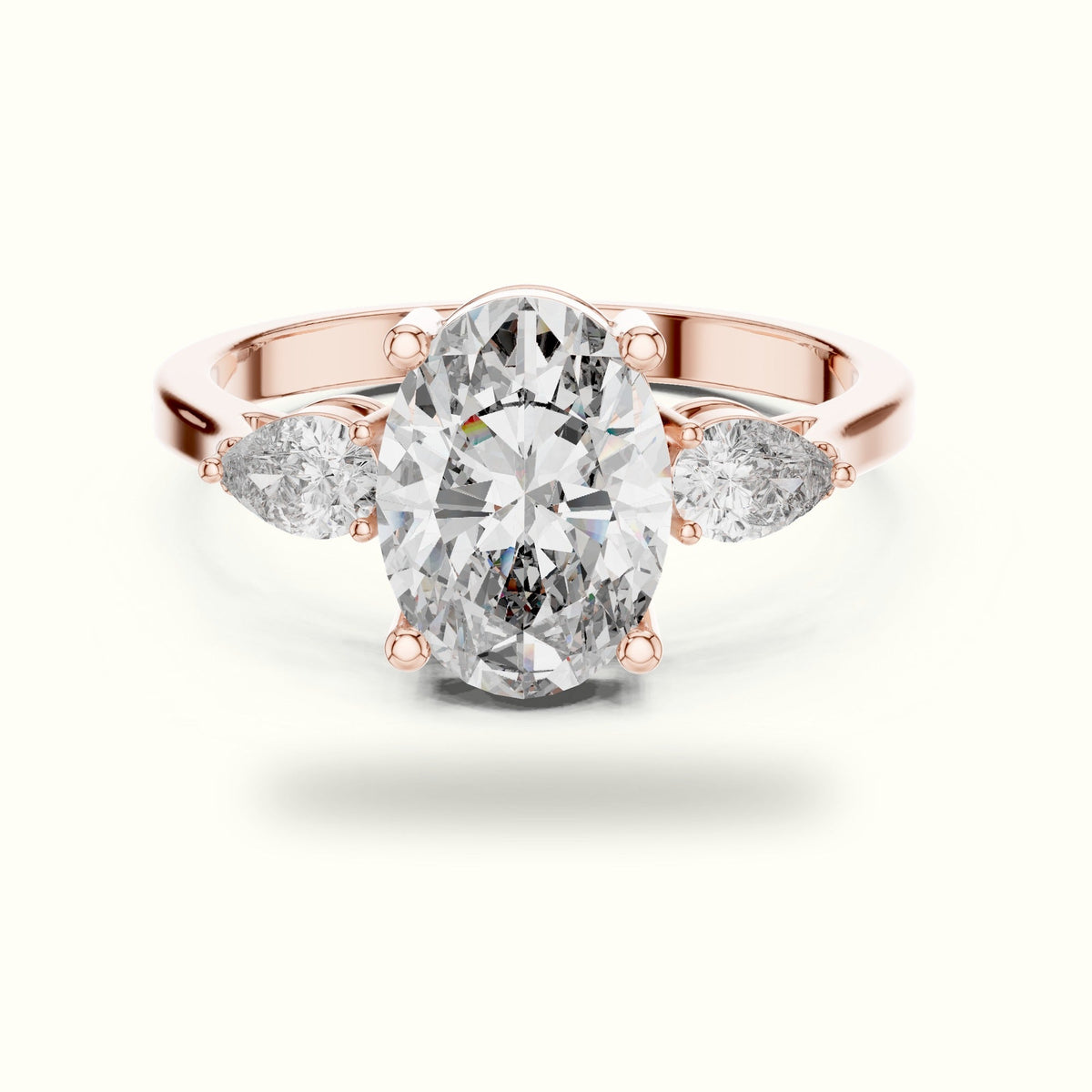 Oval Three-Stone Lab-Grown Diamond Ring — Rose gold, front view | Crystal N Cuts
