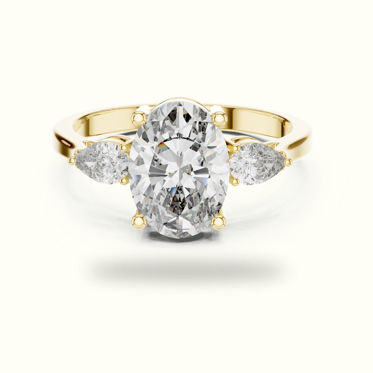 Oval Three-Stone Lab-Grown Diamond Ring — Yellow gold, front view | Crystal N Cuts