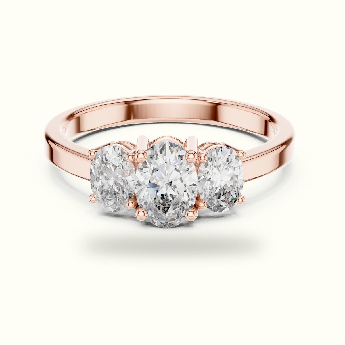 Oval Three-Stone Basket Lab-Grown Diamond Ring — Rose gold, front view | Crystal N Cuts