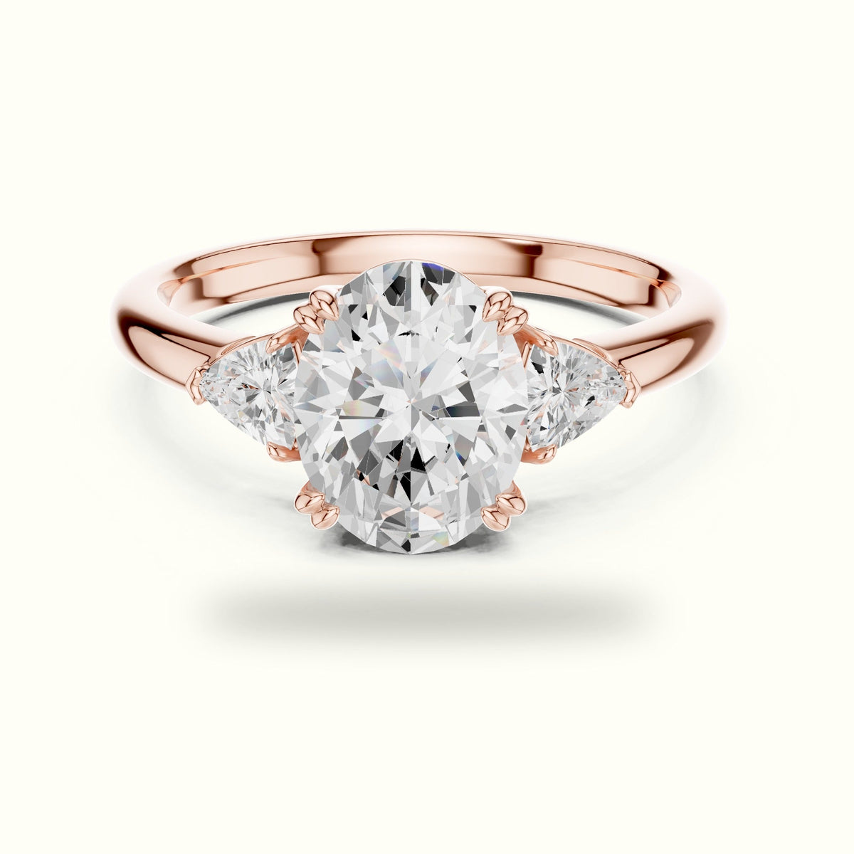 Oval Basket Lab-Grown Diamond Three-Stone Ring — Rose gold, front view | Crystal N Cuts