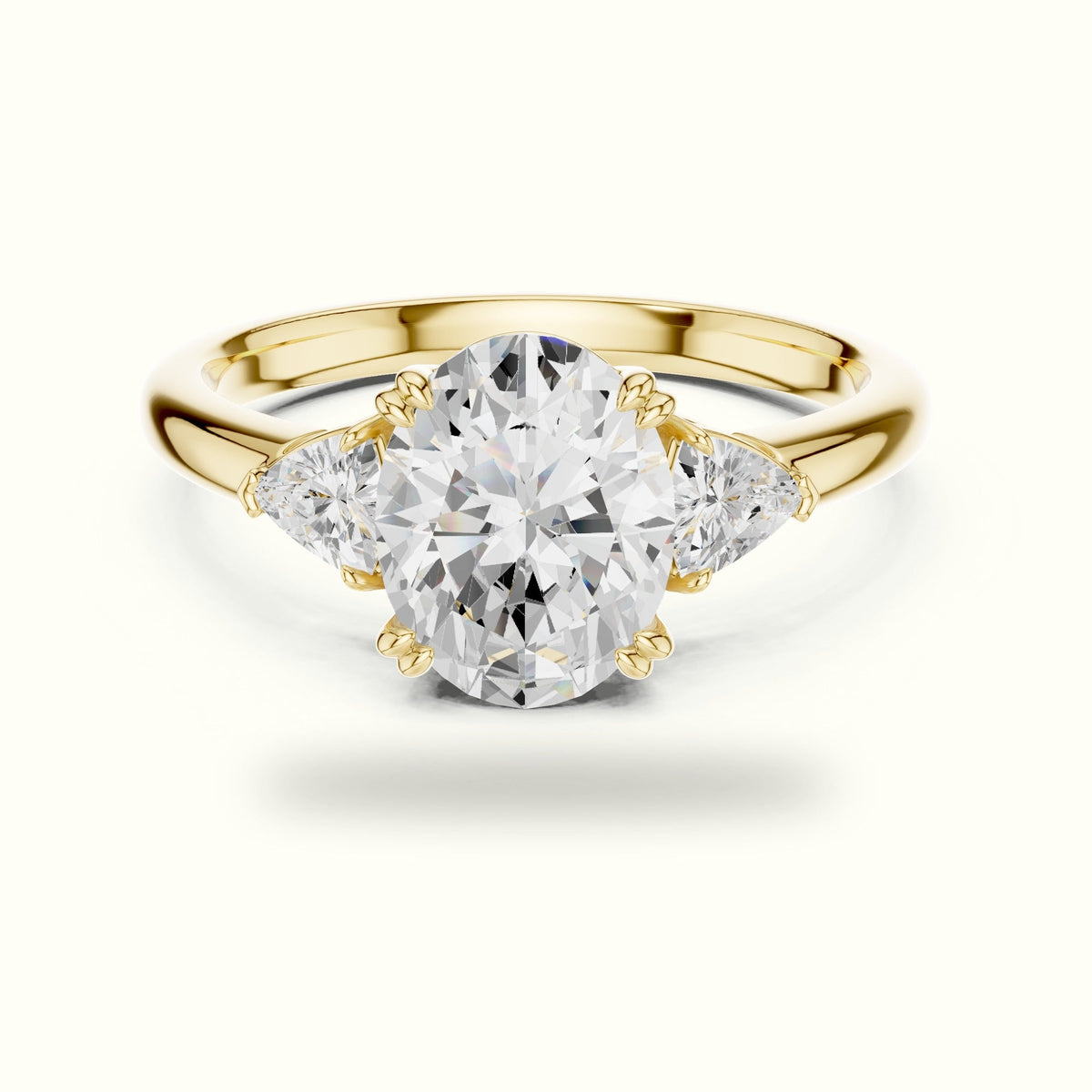Oval Basket Lab-Grown Diamond Three-Stone Ring — Yellow gold, front view | Crystal N Cuts