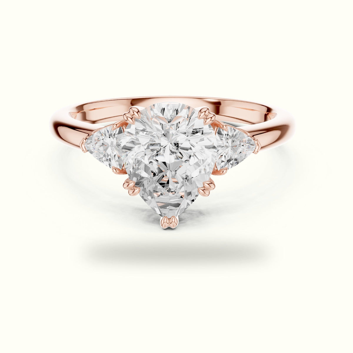 Pear Basket Lab-Grown Diamond Three Stone Ring — Rose gold, front view | Crystal N Cuts
