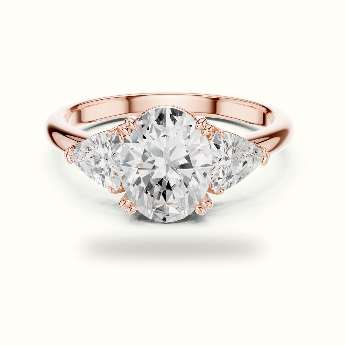 Oval Basket with Prongs Lab-Grown Diamond Three Stone Ring — Rose gold, front view | Crystal N Cuts