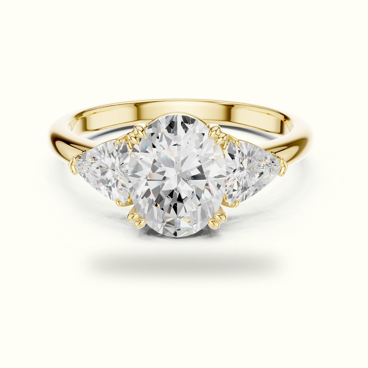 Oval Basket with Prongs Lab-Grown Diamond Three Stone Ring — Yellow gold, front view | Crystal N Cuts