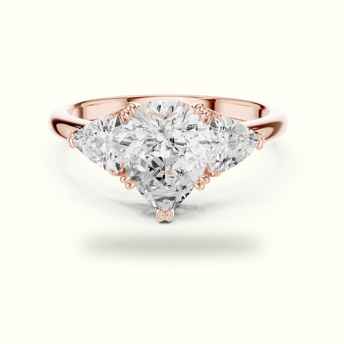 Pear Basket Lab-Grown Diamond Three Stone Ring — Rose gold, front view | Crystal N Cuts