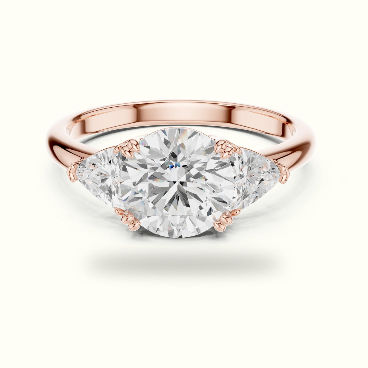 Round Three Stone Lab-Grown Diamond Ring — Rose gold, front view | Crystal N Cuts