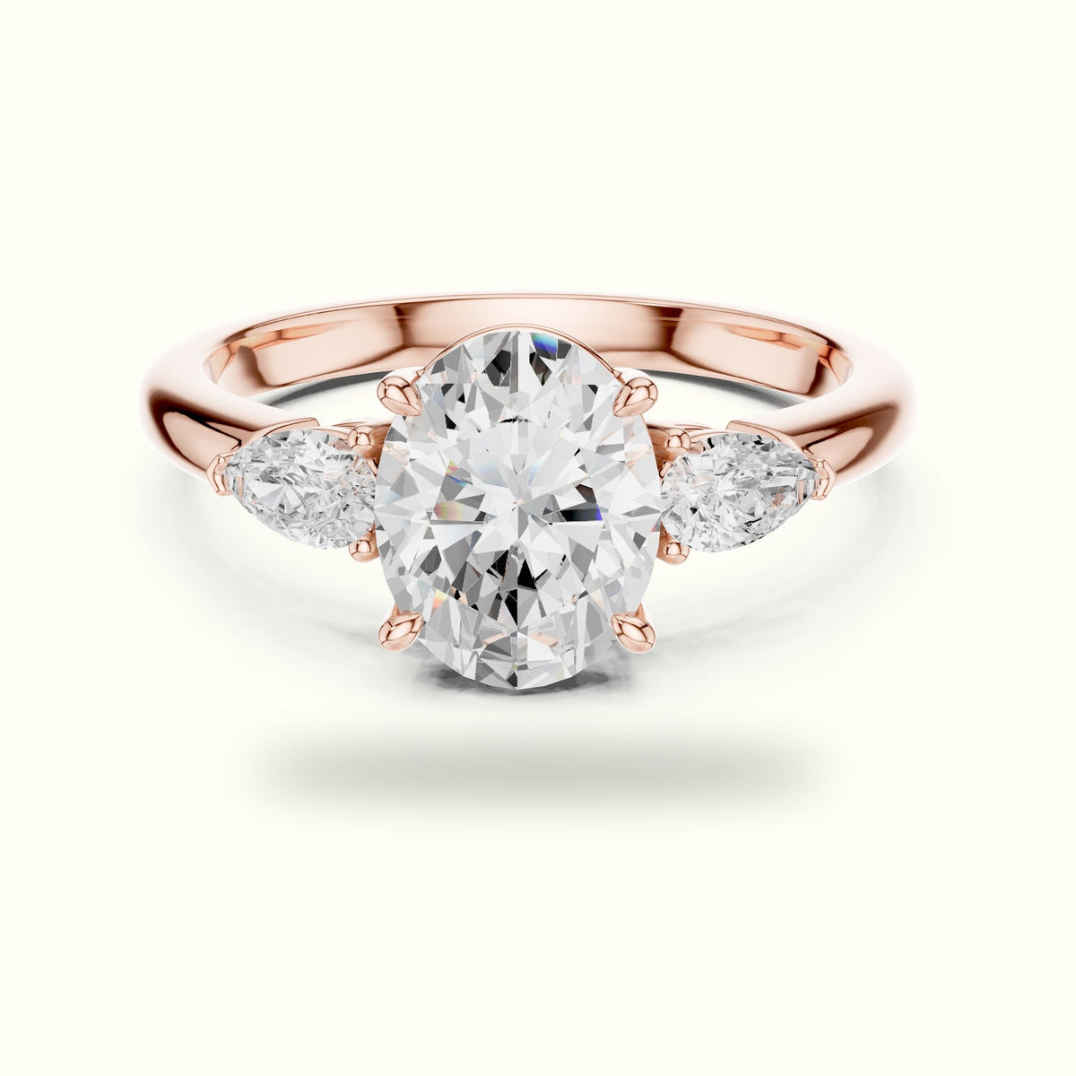 Oval Basket Lab-Grown Diamond Three Stone Ring — Rose gold, front view | Crystal N Cuts