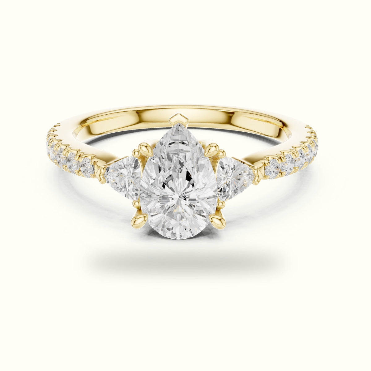 Pear Three-Stone with Accent Band Lab-Grown Diamond Ring — Yellow gold, front view | Crystal N Cuts