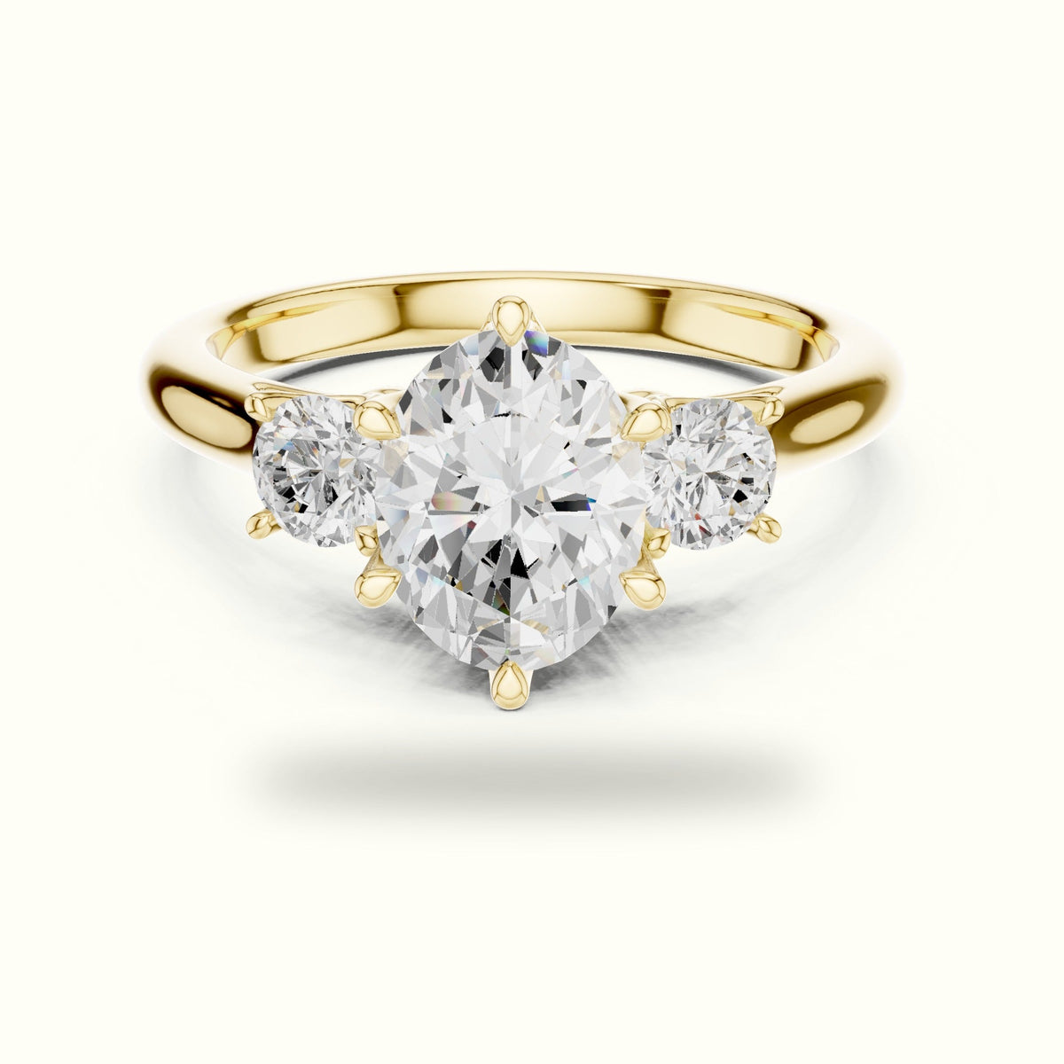 Oval Three-Stone Lab-Grown Diamond Ring — Yellow gold, front view | Crystal N Cuts