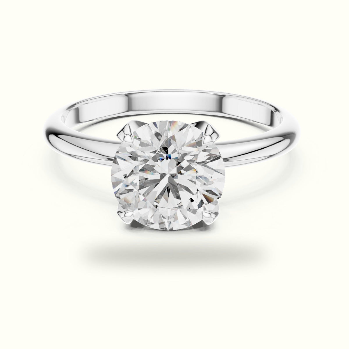 Four-Prong Round Peg Head Lab-Grown Diamond Solitaire Ring — White gold, front view | Crystal N Cuts
