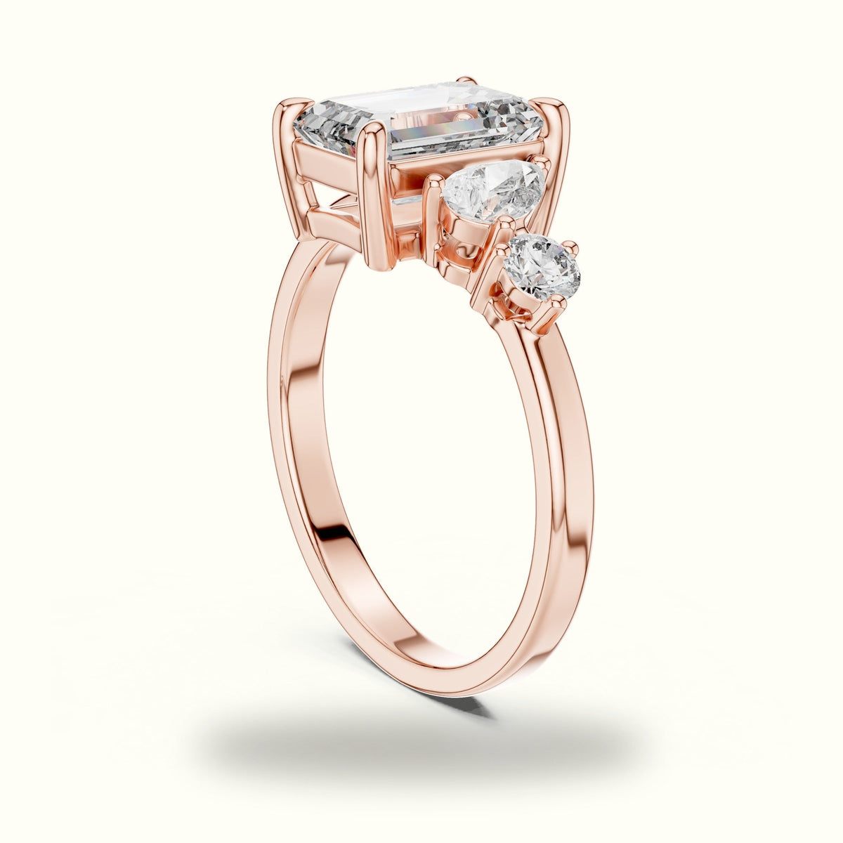 Emerald Side Stone Engagement Ring — Rose gold, view 1 | Crystal N Cuts
