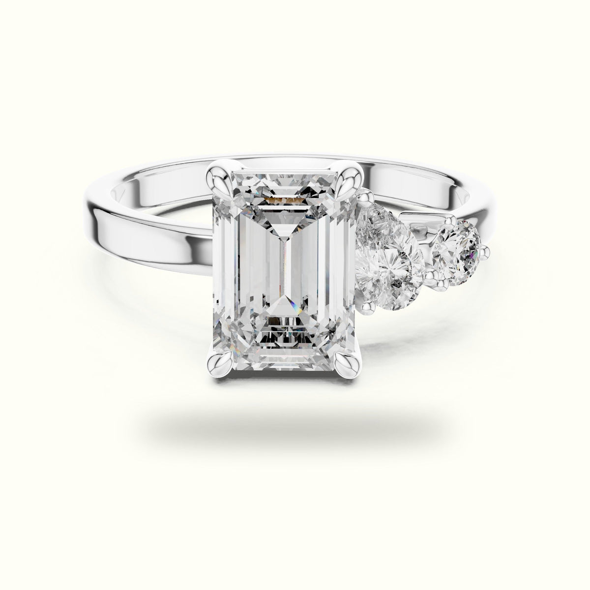 Emerald Side Stone Engagement Ring — White gold, front view | Crystal N Cuts