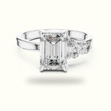 Emerald Side Stone Engagement Ring