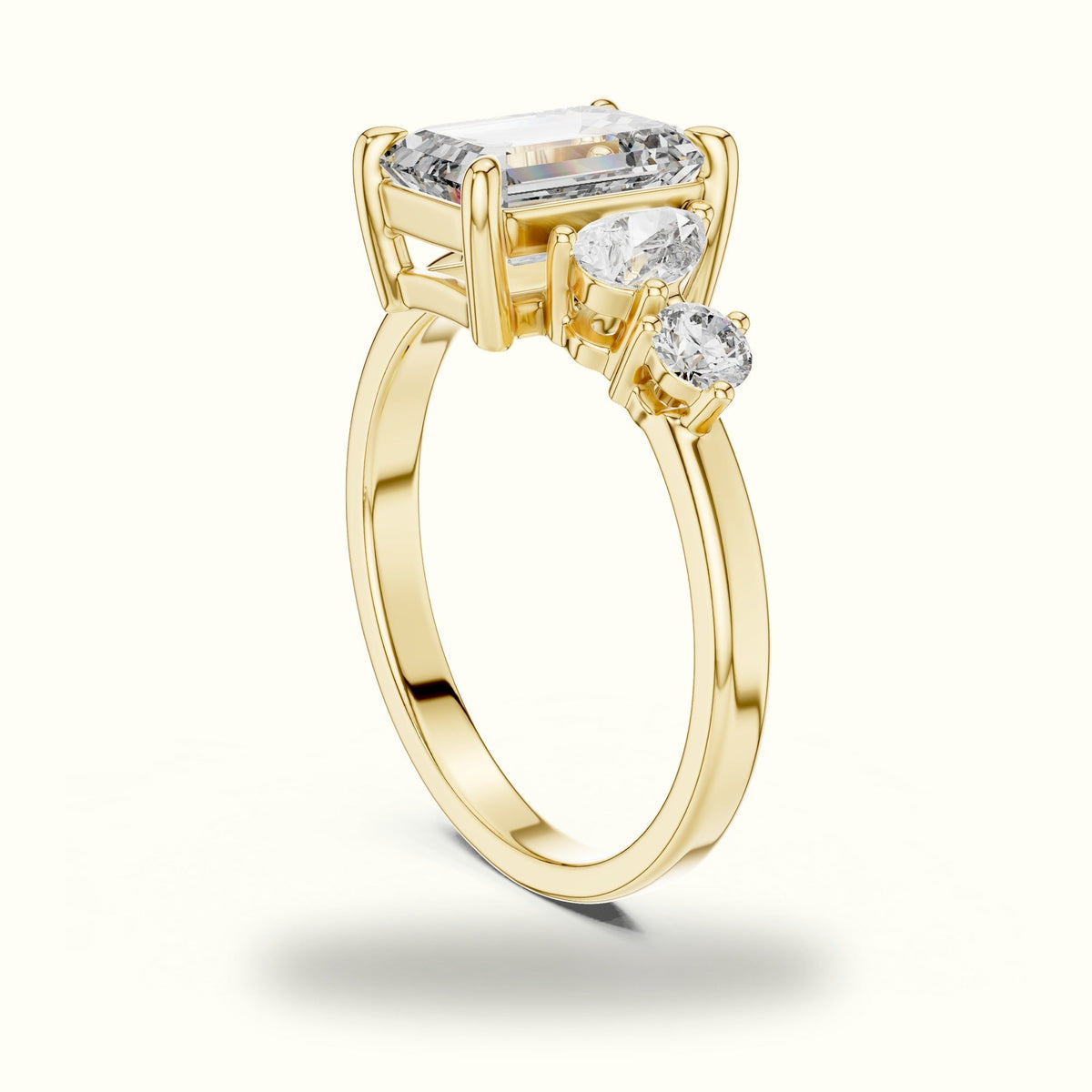 Emerald Side Stone Engagement Ring — Yellow gold, view 1 | Crystal N Cuts