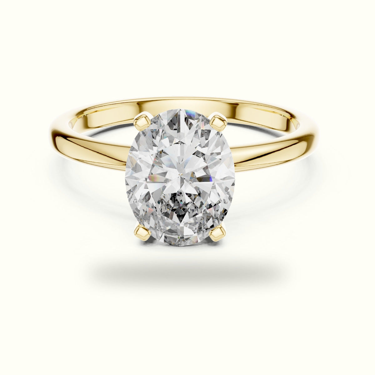 Oval Peg Head Lab-Grown Diamond Solitaire Ring — Yellow gold, front view | Crystal N Cuts