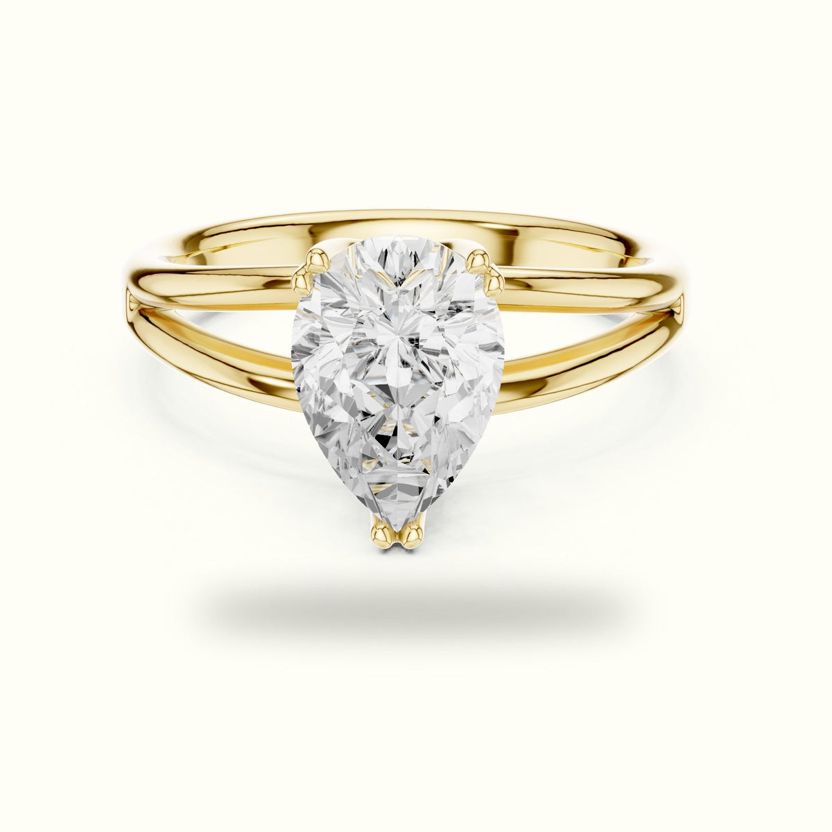 Pear Split Shank Solitaire Lab-Grown Diamond Ring — Yellow gold, front view | Crystal N Cuts