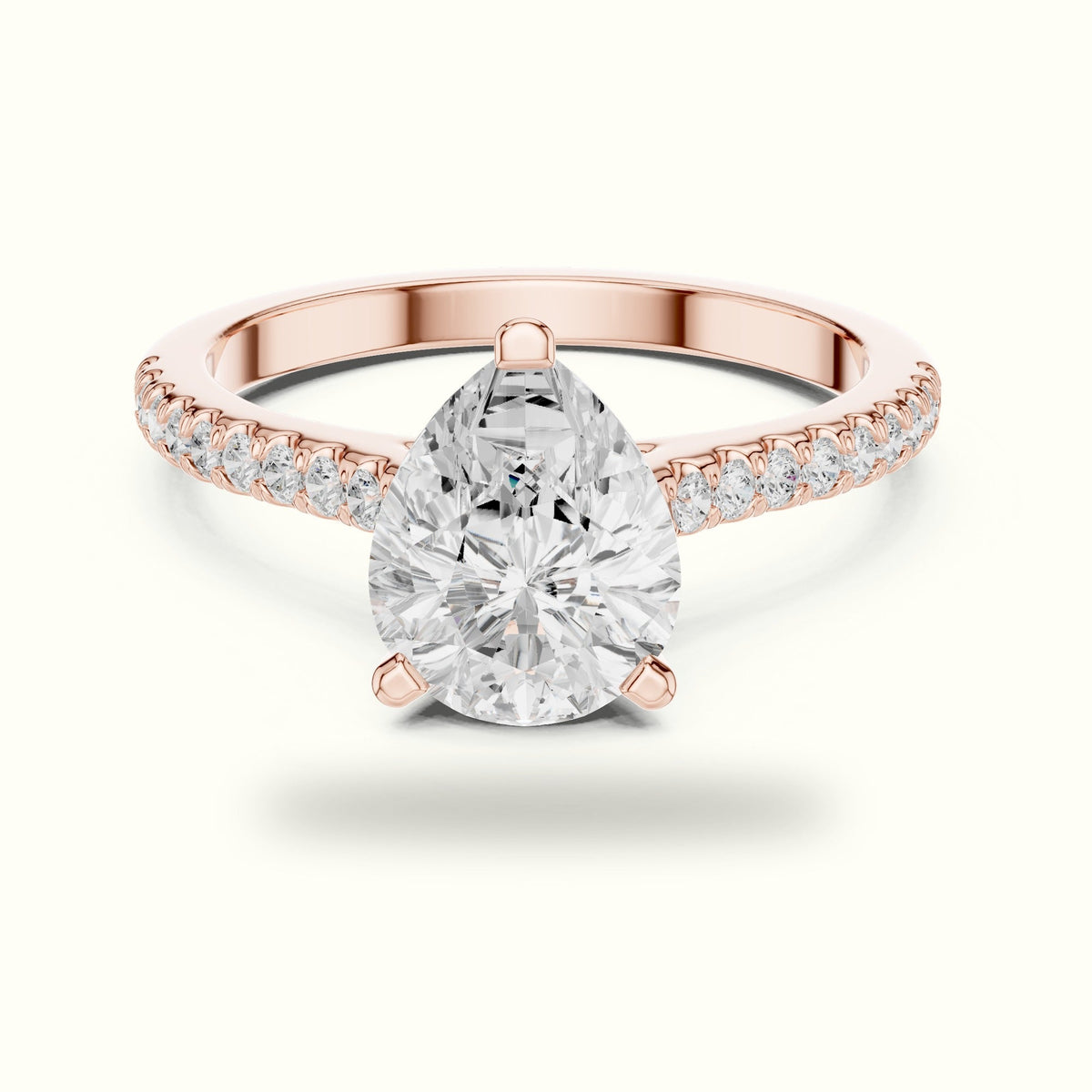 Pear Three Prong Pavé Solitaire Engagement Ring — Rose gold, front view | Crystal N Cuts