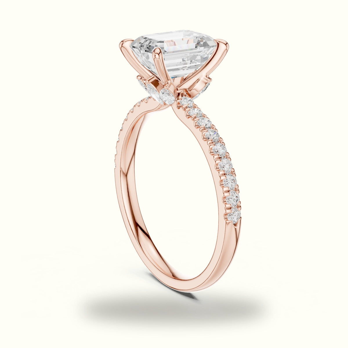Emerald Cross-Over Hidden Halo Pavé Engagement Ring — Rose gold, view 1 | Crystal N Cuts