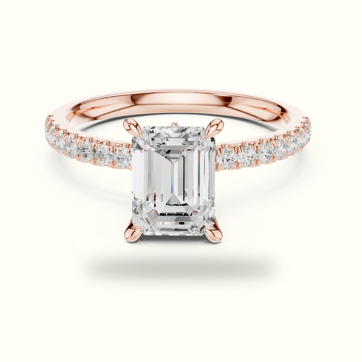 Emerald Cross-Over Hidden Halo Pavé Engagement Ring — Rose gold, front view | Crystal N Cuts