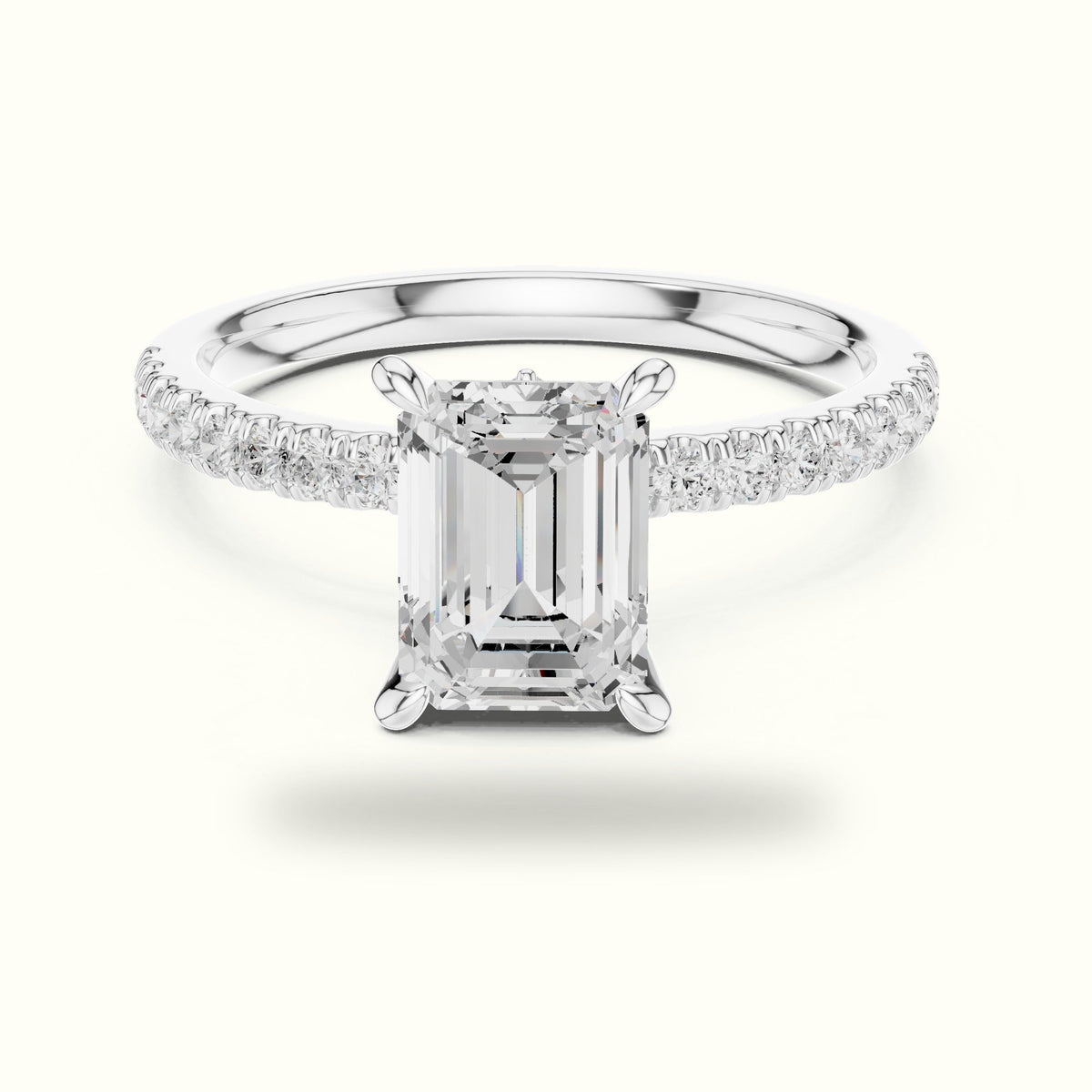 Emerald Cross-Over Hidden Halo Pavé Engagement Ring — White gold, front view | Crystal N Cuts