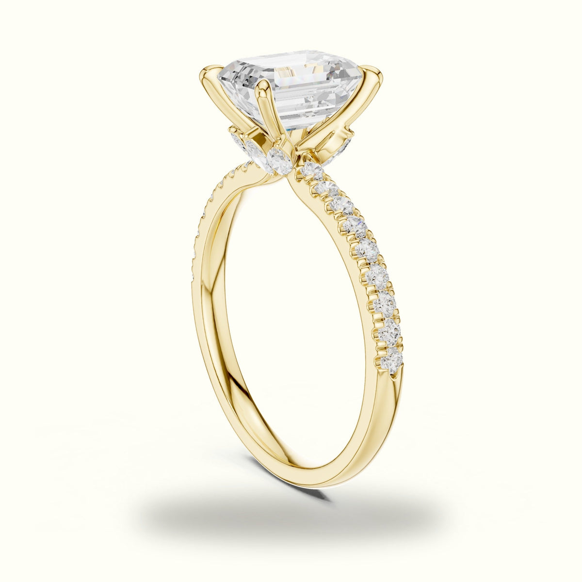 Emerald Cross-Over Hidden Halo Pavé Engagement Ring — Yellow gold, view 1 | Crystal N Cuts