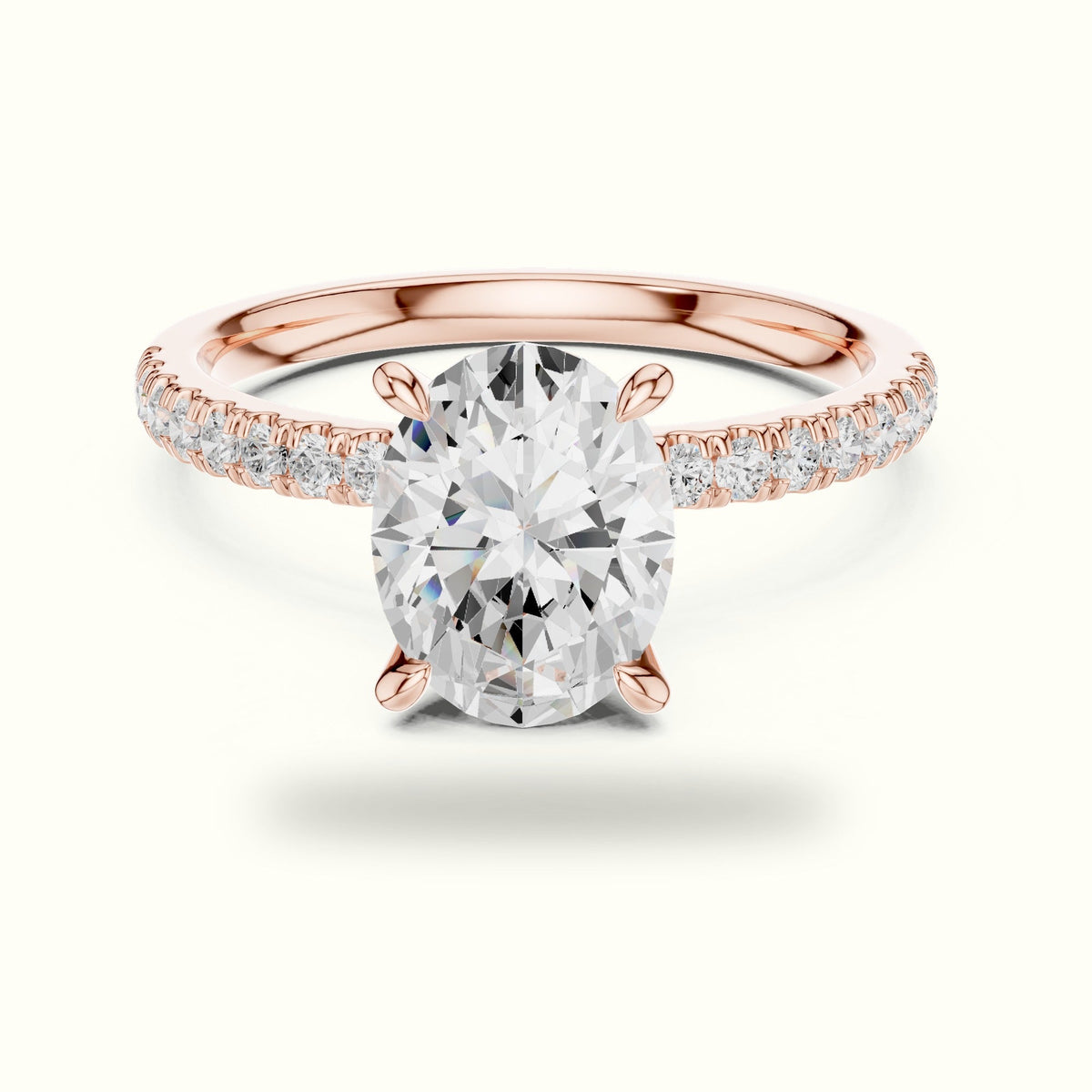 Oval Cross-Over Hidden Halo Pavé Engagement Ring — Rose gold, front view | Crystal N Cuts