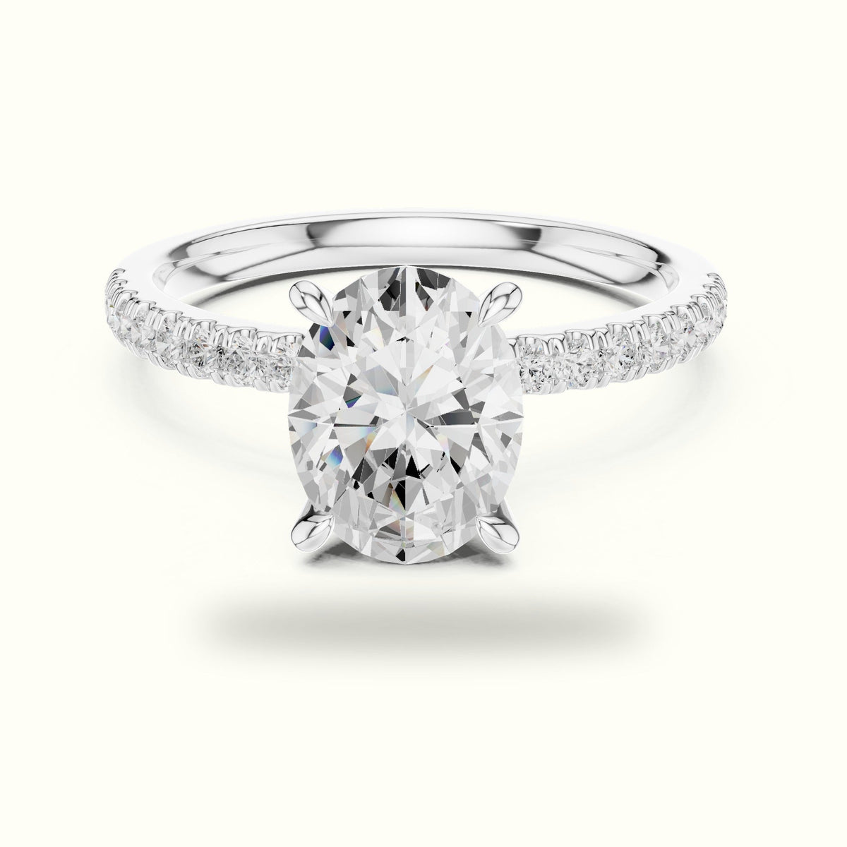 Oval Cross-Over Hidden Halo Pavé Engagement Ring — White gold, front view | Crystal N Cuts