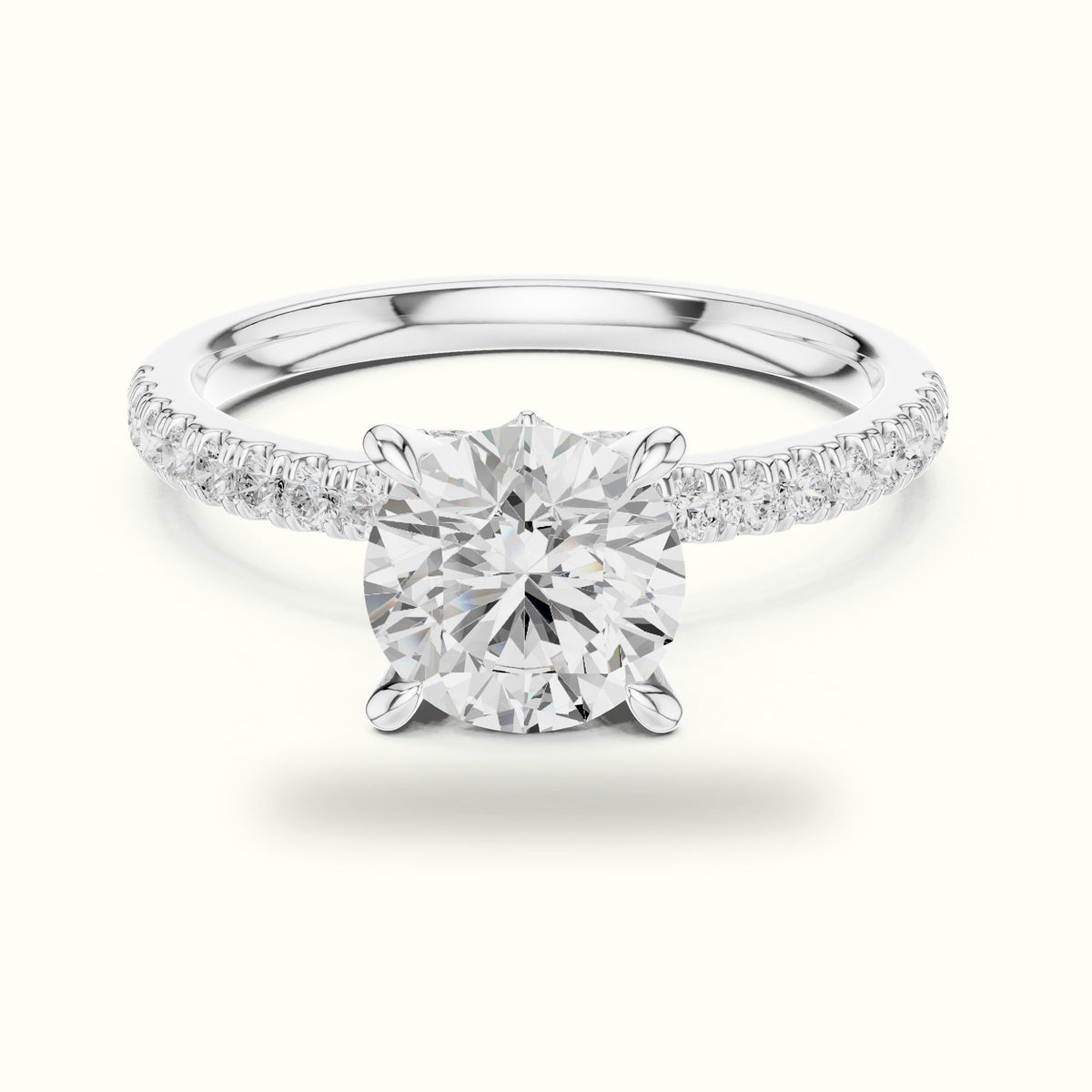Round Cross-Over Hidden Halo Pavé Engagement Ring — White gold, front view | Crystal N Cuts